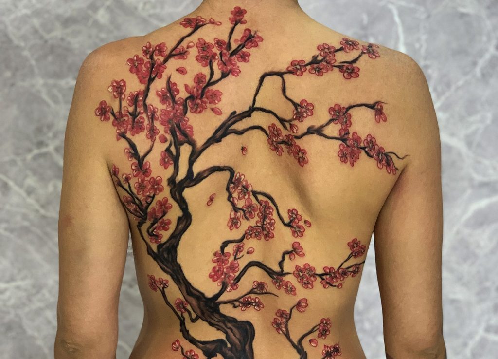 Cherry Blossom Tattoo By Mukesh Waghela At Moksha Tattoo Studio Goa India.: This is a back piece by Mukesh Waghela at mokshatattoostudio